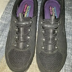 Black sketcher shoes